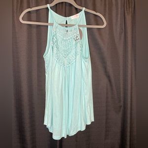Mint green tank top.